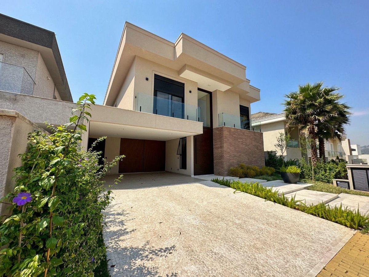 Foto 2 de Venda · Casa com 4 suítes